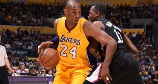 160407010911 kobe bryant luc richard mbah a moute los angeles clippers v los angeles lakers.1000x563