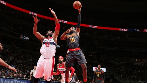 160413214546 tim hardaway jr nene hilario atlanta hawks v washington wizards.1000x563