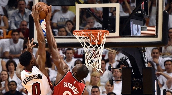 160513233435 josh richardson bismack biyombo nba playoffs toronto raptors at miami heat.1000x563