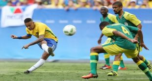 brazilian winger neymar l shoots the ball against three south african defenders