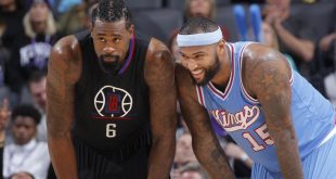 DeAndre Jordan DeMarcus Cousins look on iso