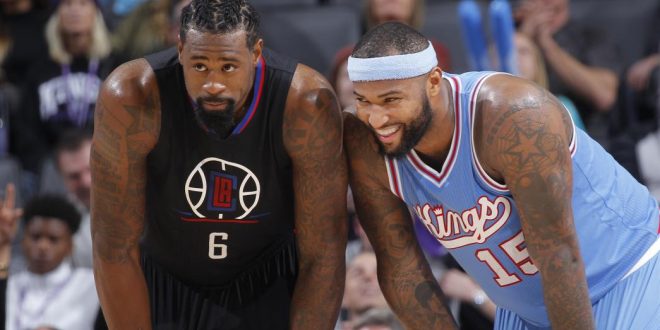 DeAndre Jordan DeMarcus Cousins look on iso